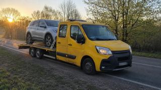 Laweta z SUV-em o wschodzie słońca – Krosno